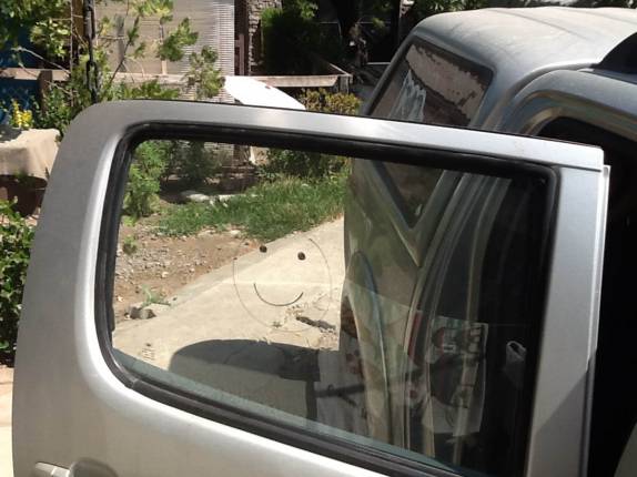 A Fiona, sorridente e de vidro novo, em Santiago, capital do Chile. Uma bela surpresa do Pablo